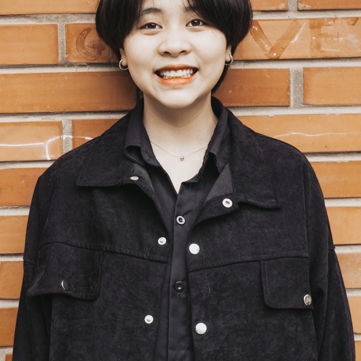 Mil o Chen, Client Relations Director, discussing corporate gifting strategy with business clients